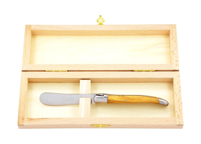 Couteau à beurre Laguiole. Finition inox mat avec manche galbé en bois d'olivier