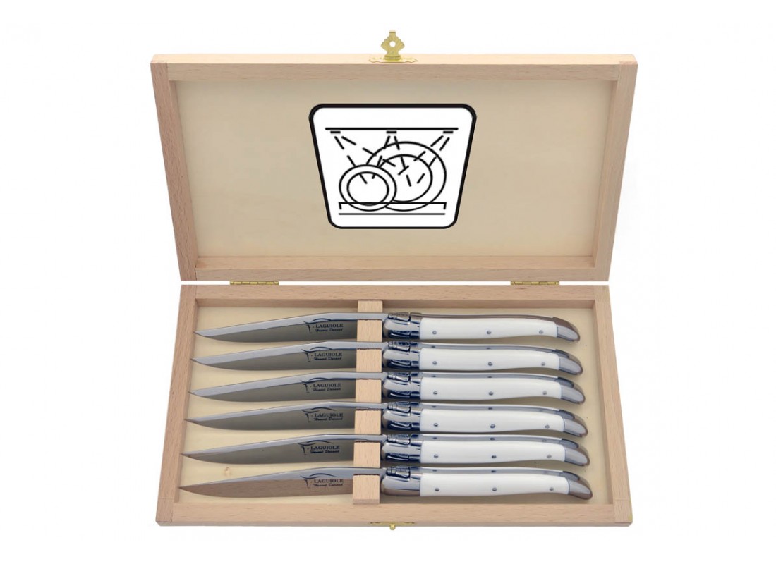 Laguiole steak knives. Slim white Corian handles with shiny stainless steel  bolsters. Dishwasher safe Length of handle 12 cm Bolsters 2 stainless steel  bolsters in shiny finish Packaging Box of 6 Nature