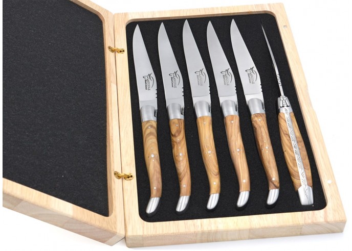 Laguiole steak knives with matt stainless steel bolsters. Wide olive wood handles