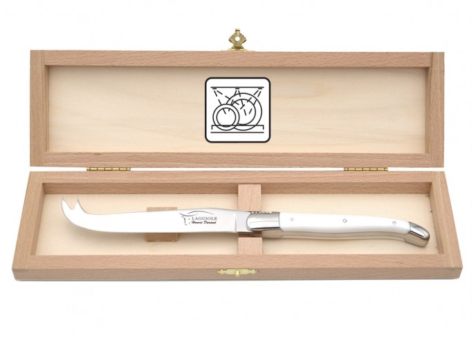 Laguiole cheese knife with shiny stainless steel bolsters. Slim white Corian handle, dishwasher safe