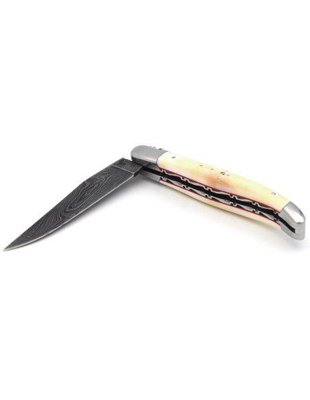 Laguiole pliant 12 cm, lame damas, doubles-platines, manche en dent de phacochère & intercalaire rouge
