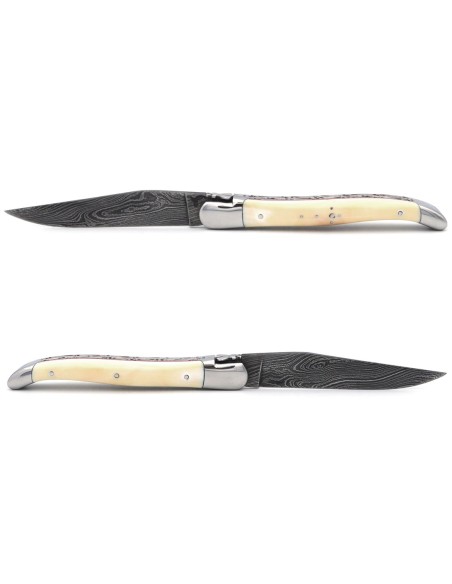 Laguiole pliant 12 cm, lame damas, doubles-platines, manche en dent de phacochère & intercalaire rouge