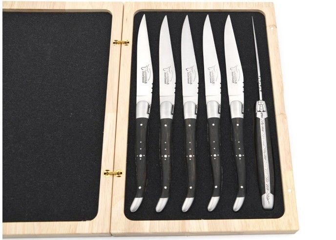 Laguiole steak knives with matt stainless steel bolsters. Wide ebony wood handles