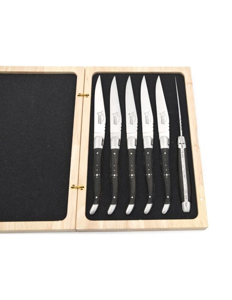 Laguiole steak knives with matt stainless steel bolsters. Wide ebony wood handles