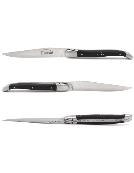 Laguiole steak knives with matt stainless steel bolsters. Wide ebony wood handles