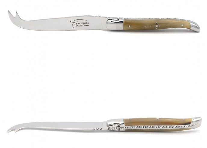 Laguiole cheese knife with shiny stainless steel bolsters. Wide pale horn tip handle