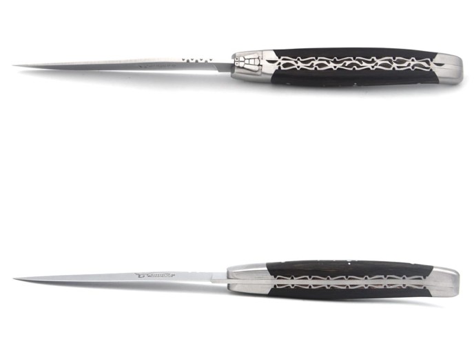 Laguiole steak knives with matt stainless steel bolsters. Wide ebony wood handles