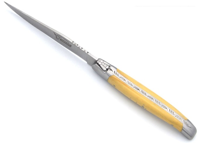Laguiole steak knives with matt stainless steel bolsters. Wide boxwood handles