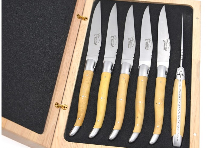 Laguiole steak knives with matt stainless steel bolsters. Wide boxwood handles