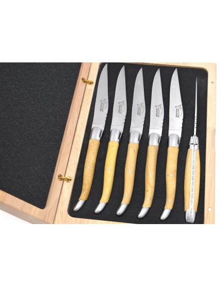 Laguiole steak knives with matt stainless steel bolsters. Wide boxwood handles