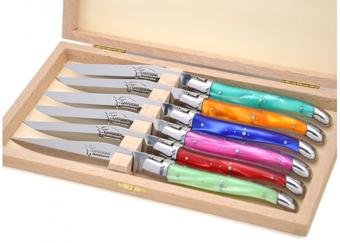 Laguiole steak knives. Slim pearly acrylic handles with shiny stainless steel bolsters
