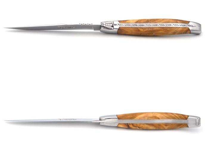 Laguiole steak knives with brass bolsters. Wide olive wood handles