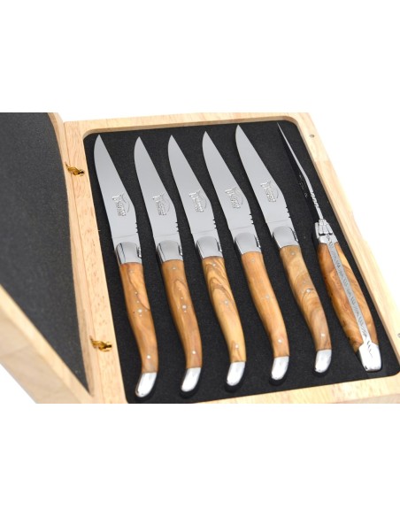 Laguiole steak knives with brass bolsters. Wide olive wood handles
