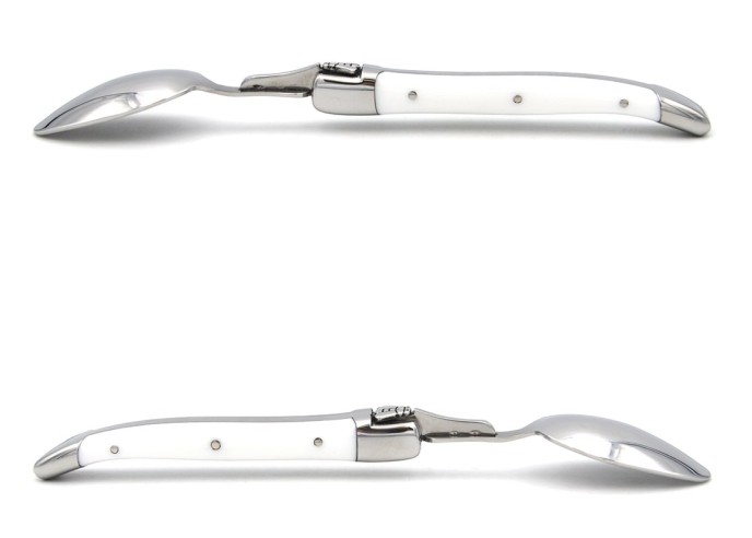 Laguiole tea spoons with shiny stainless steel bolsters. White Corian handles.Dishwasher safe.