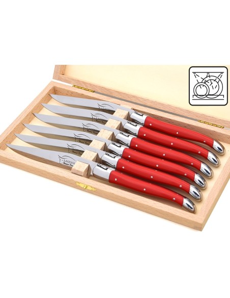Laguiole steak knives. Slim red Corian handles with shiny stainless steel bolsters. Dishwasher safe