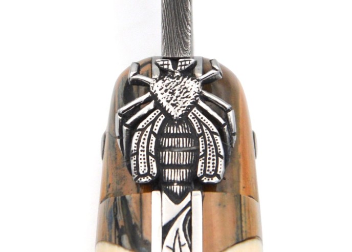 Laguiole knife with mammoth tusk handle and bolsters