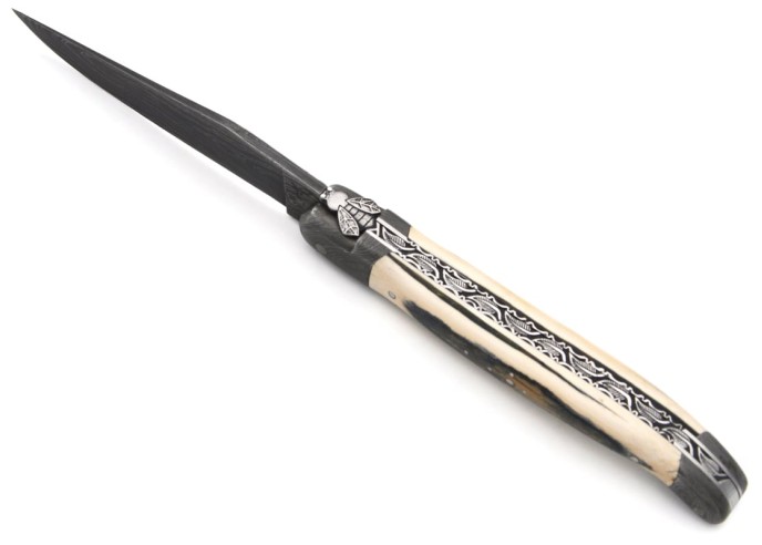 Mammoth tusk with Damascus steel bolsters