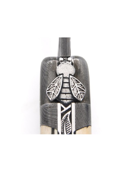 Mammoth tusk with Damascus steel bolsters