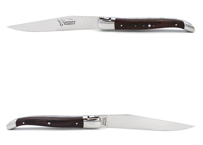 Laguiole steak knives with shiny stainless steel bolsters. Purplewood