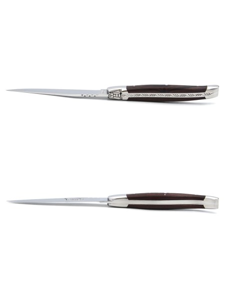 Laguiole steak knives with shiny stainless steel bolsters. Purplewood