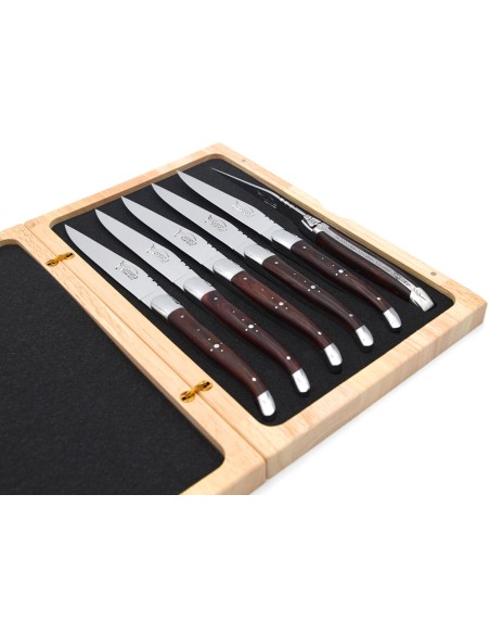 Laguiole steak knives with shiny stainless steel bolsters. Purplewood