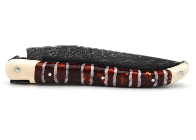 Couteau de Laguiole en molaire de mammouth rouge, lame Damas mosaïque