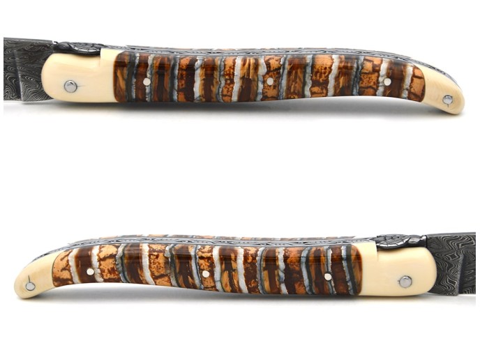 Laguiole knife in brown mammoth molar, mosaic Damascus blade