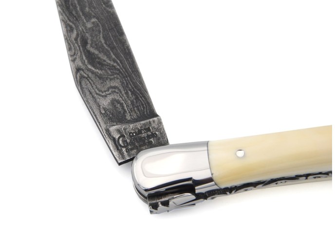 Laguiole GI, warthog tooth, Damascus blade, bee and spring chiselled
