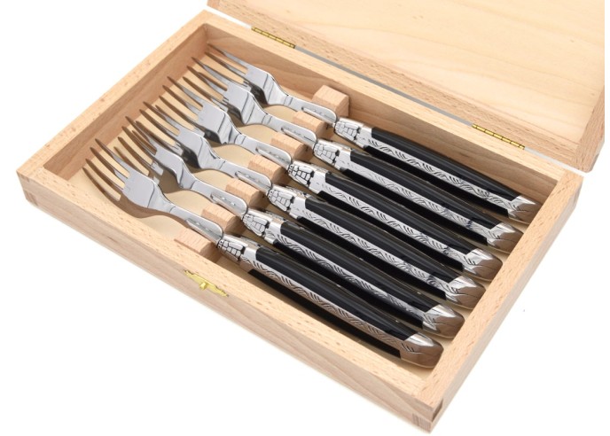 Laguiole forks with shiny stainless steel bolsters. Wide pale horn tip handles