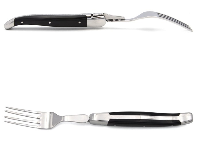 Laguiole forks with shiny stainless steel bolsters. Wide pale horn tip handles