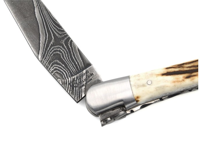 Laguiole knife with GI, 12 cm deer antler handle, wild Damascus blade