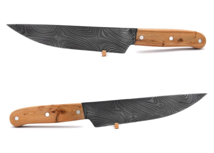 Kitchen knife with a Damascus blade and juniper wood handle